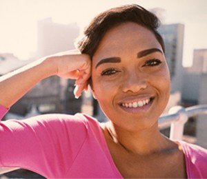 A young woman smiling