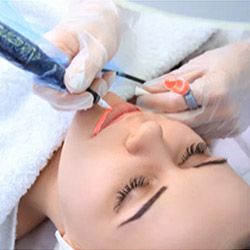 Woman having her makeup done